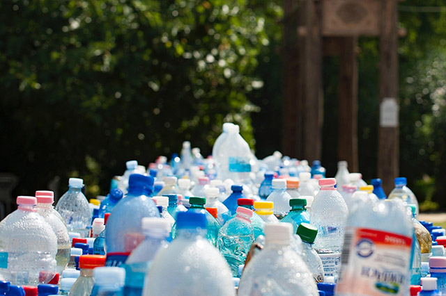 plastic two liter bottles on a conveyor belt